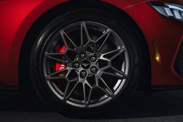 2024 Ford Mustang® model with a close-up of a wheel and brake caliper | Ed Morse Ford St. Robert in Saint Robert MO