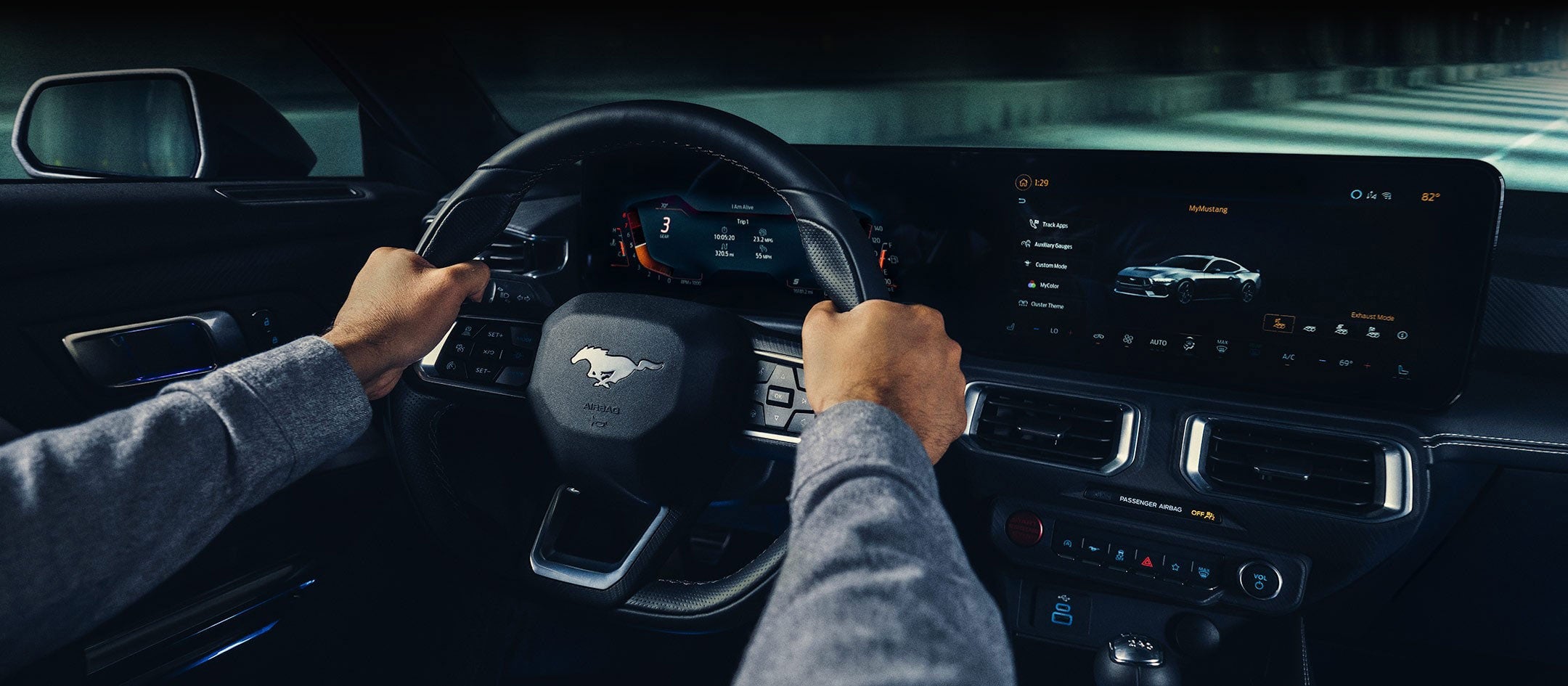 A 2024 Ford Mustang® model interior with a person driving | Ed Morse Ford St. Robert in Saint Robert MO